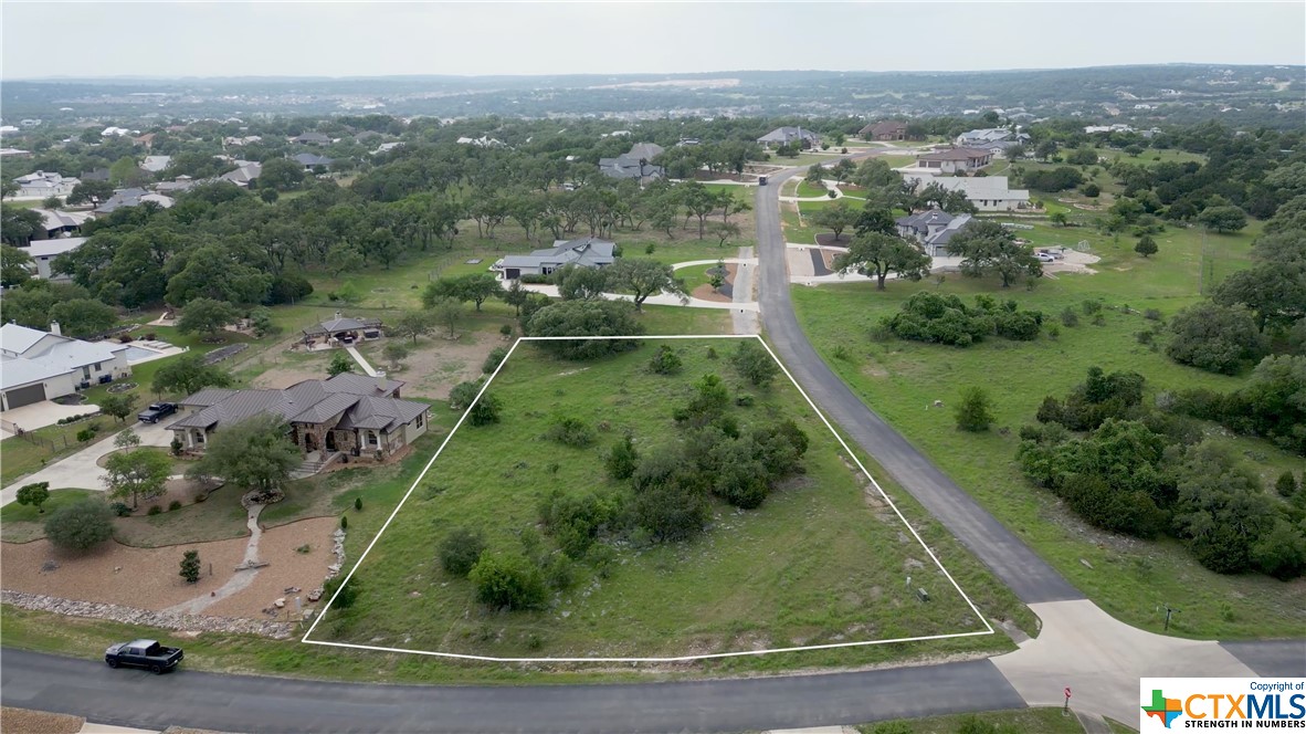 You've FINALLY found the perfect, private hill country property to build your dream home! Located in the premier and highly-desirable gated section of Vintage Oaks, this CORNER lot offers almost endless property layouts and views. You get the hill country atmosphere, while only being minutes away from everything New Braunfels, Bulverde, and Canyon Lake have to offer! If that's not enough, you'll enjoy the unmatchable amenities this community offers: 3 pools with a lazy river, covered outdoor area with outdoor kitchen, walking trails, basketball court, volleyball court, and tennis court, and a MASSIVE fitness center. You need to see it for yourself, so take a stress-relieving drive out to Vintage Oaks today and see it all for yourself- you won't regret it!