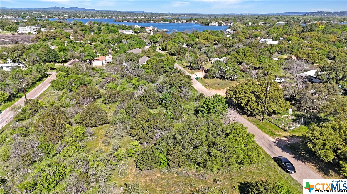 A GREAT DOUBLE LOT AT A GREAT PRICE! A fantastic offering in the booming city of Granite Shoals. This double lot has fantastic buildability and is walkable to the community Park. Lots of new construction in the area - could make a great investment home, second home, or build your dream home! NO HOA - water & electric at the street. Come see it today!!