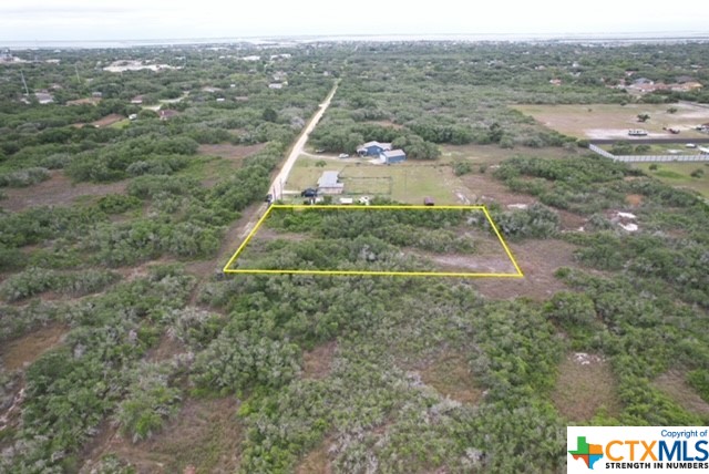 Beautifully wooded 1.5 acres in the city limits of Aransas Pass!!  Come build your dream home and spread out on your own personal oasis.  This is down a beautiful dead end road so come enjoy the privacy while it still lasts.