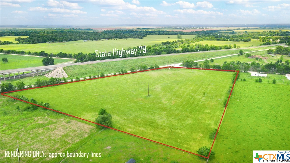 Central to San Antonio, Houston and Dallas and less than 80 miles to both Austin and Waco, this +/- 7.9 acres is highly visible from State Hwy 79. Electric lines on site, perimeter fenced with current AG valuation in place, and hard corner location at CR353 and 352. This location offers versatility with no restrictions, hold ability with hay lease and Ag exemption, and easy access for both east and west bound traffic. A great place for both business and home. Seller Financing will be considered with acceptable terms.