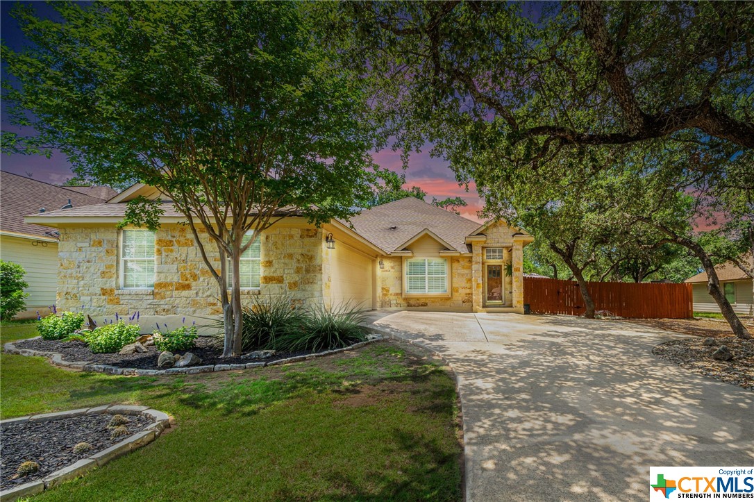 Discover the charm of the Texas Hill Country in the idyllic town of Wimberley.Enjoy the quaint, small-town ambiance that lies between the vibrant cities of Austin and San Antonio. This home is perfectly situated on a peaceful cul-de-sac and backs up to large green space, providing additional privacy. Its prime location offers convenient access to local Elementary, Junior High, and High Schools.
Step outside into the serene private backyard, an oasis designed for memorable entertainment under the starlit summer skies! This backyard haven provides a space for gatherings, relaxation and soaking in the natural beauty that Wimberley has to offer.