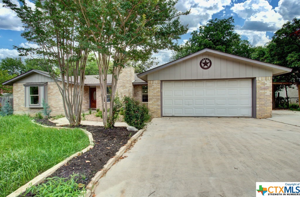 Welcome Home to this fantastic remodel in New Braunfels! Beautifully updated kitchen with fantastic grand island, gas cooking and elevated vent hood, also includes refrigerator! New flooring throughout. New windows throughout. Fantastic upgraded primary bedroom with ensuite double vanity, dual closets (one is HUGE!), upgraded walk in shower bath also nicely updated with plenty of room. Don't forget the spacious backyard with inground pool, fun indoor/outdoor "bar", and last but not least - a great detached 15x11 craft room or "cave" with electricity. Tons of potential uses for this space! OH - forgot to mention that the driveway was also expanded for easy parking of at least 3 vehicles, plus an oversized garage. No HOA. Close to everything NB has to offer and easy on/off access to I35.  What a great find!