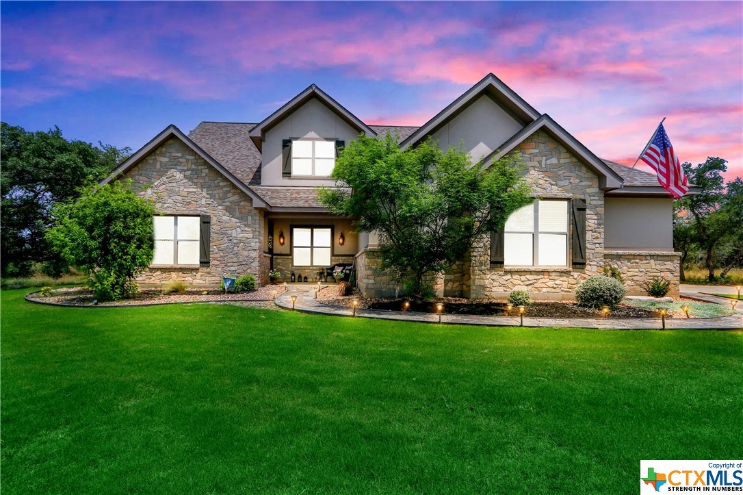 Nestled within the Texas Hill Country, this property is the epitome of luxurious rural living. Spread across sprawling acres of landscape on a picturesque pond and surrounded by nature, this 4 bed 4 bath home is an absolute must see! 

Approaching the residence, you're greeted by a long driveway, landscaped yard and beautifully maintained exterior. 

Inside, be greeted by an open floorplan, stunning top of the line bamboo wood flooring, vaulted ceilings, large windows and sliding doors allowing an abundance of natural light and stunning views of the surrounding countryside.

The heart of the home features a gourmet kitchen, complete with breathtaking leather granite countertops, a large center island, and custom cabinetry, all showcasing high-end features, upgrades and appliances. 

Retreat to the luxurious master suite complete with a dreamy ensuite bath and walk-in closet. Three other bedrooms each with their own en-suite full size bathroom offer plenty of space for family and friends alike.

Custom built-ins throughout the home add both functionality and charm.  Everyday chores become a delight in the thoughtfully designed laundry room! Every detail of this property has been carefully curated.

Additionally, Vintage Oaks has a state of the arc fitness center and three swimming pools.  For those looking to venture out, the location of this property is unbeatable. Situated just outside of New Braunfels and a stone’s throw from Historic Gruene or short drive to Canyon Lake, there is fun and adventure for everyone!  

Whether enjoying the tranquility of the natural surroundings, entertaining in style, or enjoying the neighborhood amenities, this home offers the quintessential Hill Country lifestyle on your own slice of Texas.
