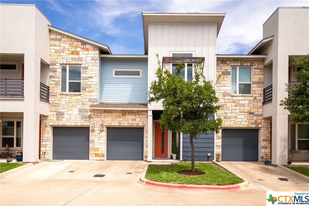 Explore tranquillity at Haven Condominiums, nestled in vibrant South Austin. This unit features a spacious island kitchen with granite counters, stainless appliances, gas cooking, a large walk-in pantry, and a white shaker-style cabinetry. Enjoy the airy open concept living space with 10' ceilings and large windows overlooking a serene backyard. Step onto the custom deck for maintenance-free outdoor living. Upstairs, find a luxurious owner's suite with vaulted ceilings and a spa-like bath. Two guest rooms offer treetop views. Residents enjoy gated access, a private dog park, and proximity to South Austin's best attractions, including parks, dining, and entertainment. Welcome to Haven! HOA dues cover gas, water, trash, recycling, common area & front yard maintenance and pest control.