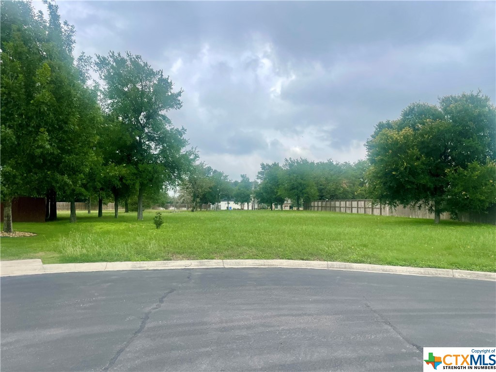Large .53 acre residential lot in a secluded cul-de-sac with oak trees and plenty of buildable space. This prestigious and restricted gated neighborhood of Oak Creek offers a private pond with a fishing pier and a private park along Geronimo Creek. The lot is minutes from grocery stores, hospital, schools, and easy accessibility to I-H 10. Utilities are in place.