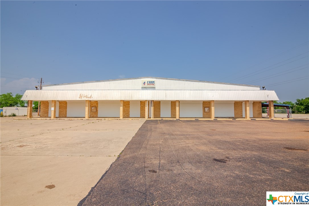 This established Commercial Property located on +/- 6.26 Acres in Victoria, Texas, the heart of the Golden Cresent, has limitless possibilities!  Close to Highway Junction US59 and TX185, the main building/warehouse is +/- 27,900 sqft! This area includes a huge showroom (potential for multiple) and retail area,  tons of office spaces, a large kitchen, ample warehouses in the back with garage door entrances and exits, a truck wash, and a dedicated server room upstairs.  Outside this massive building is a huge wrap-around covered porch/carport area and two separate large metal buildings. One hosts a spacious +/- 368 sqft walk-in freezer, more warehouse/garages, and some office spaces.  The other has more office space and a kitchen area too! There is also plenty of yard for equipment and inventory.  Plan your new business or business move and schedule your showing today!