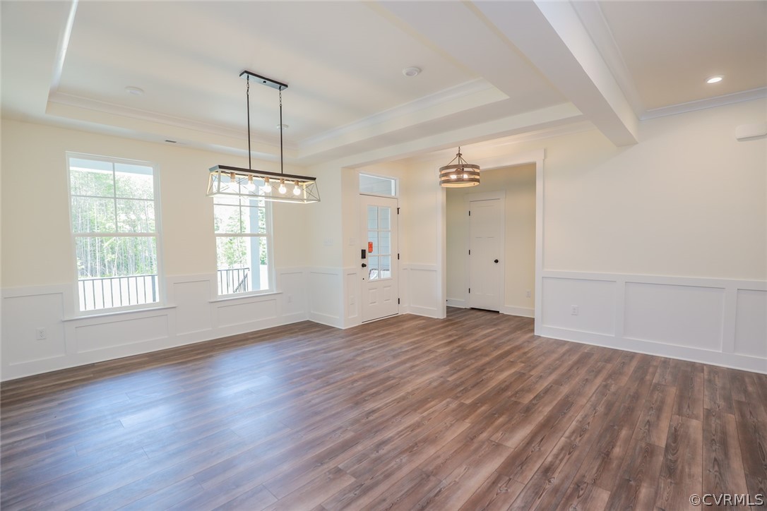 Photo represents the plan, not the actual home. Design selections may vary. Formal dining room w/ tray ceiling, decorative window package and EVP floors.