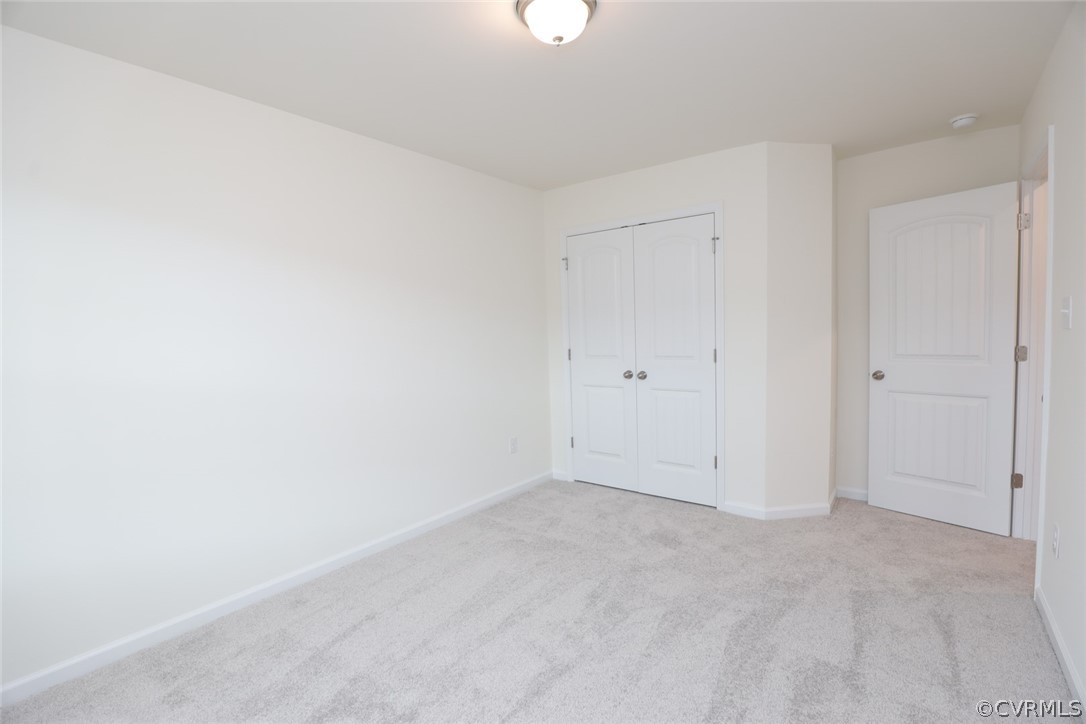 Two additional bedrooms with carpet and double door closet.
