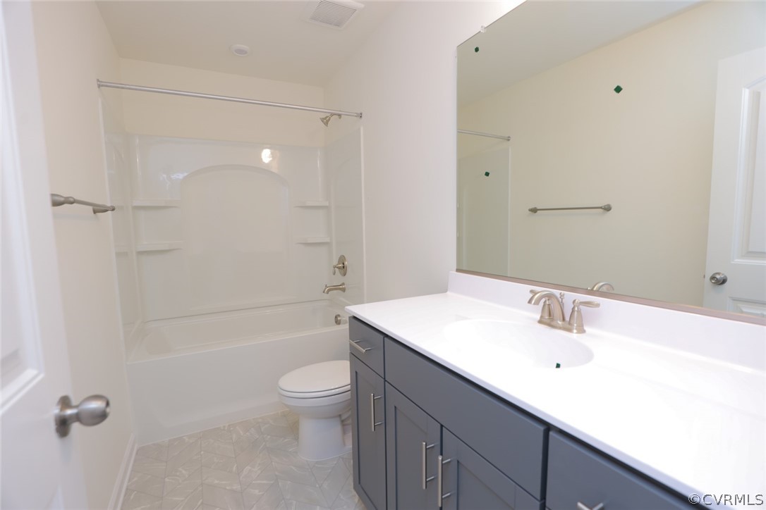Additional full bath with tub/shower combo.