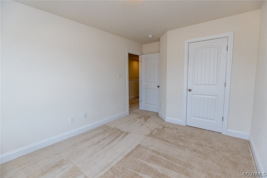 Photo represents the plan, not the actual home. Design selections may vary. Two additional bedrooms with carpet and double door closet, an additional full bath, and convenient hall laundry complete the second floor.
