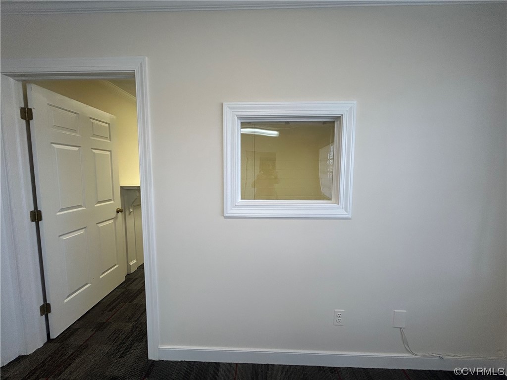 window to reception area from 3rd office