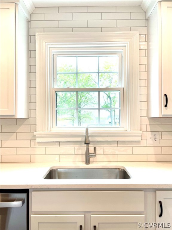 Kitchen sink and window, tile to ceiling