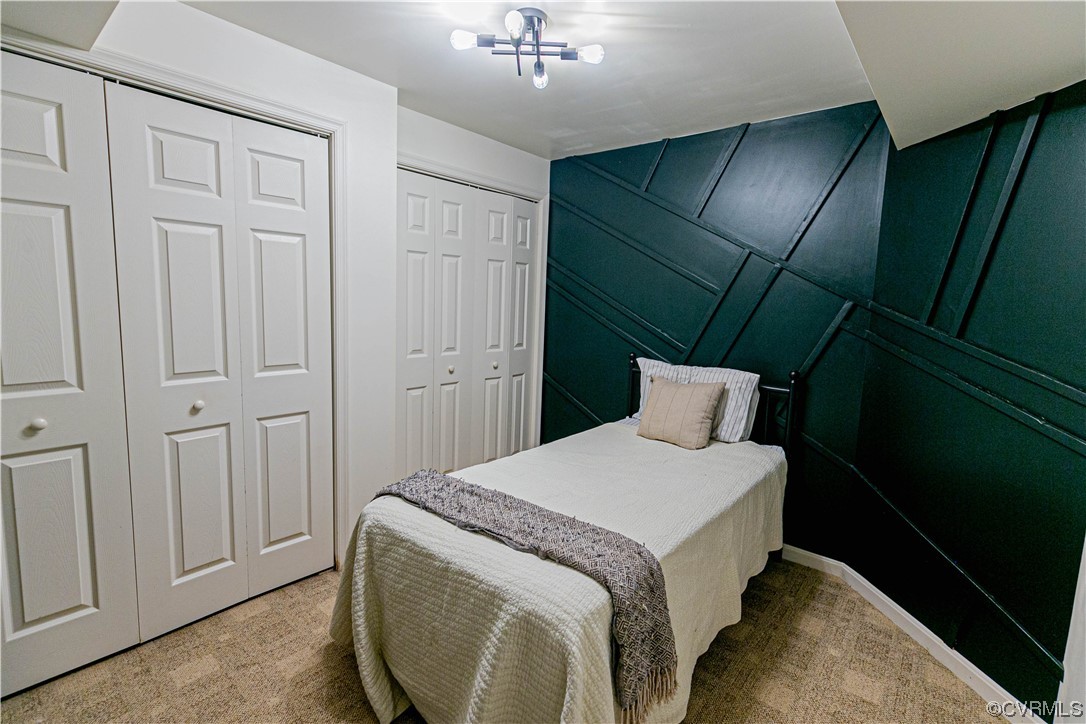 Carpeted bedroom 4  with two closets