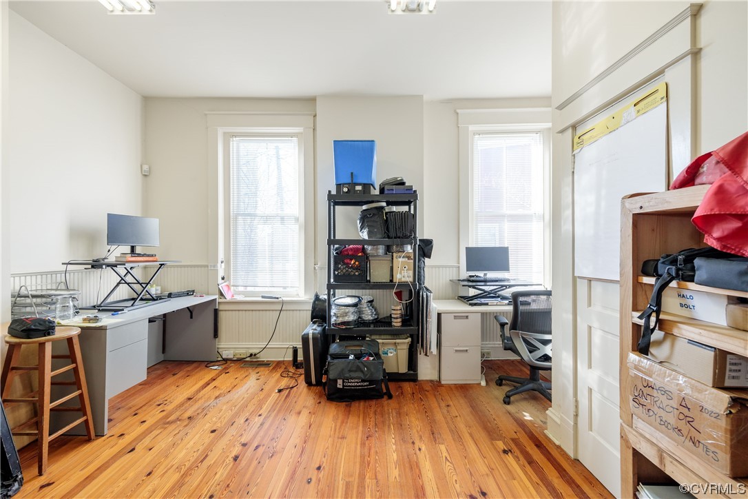 Office space featuring light wood-type flooring
