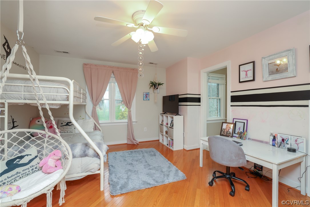 Spacious bedroom on second floor with hardwoods, walk in closet, and jack and jill bath