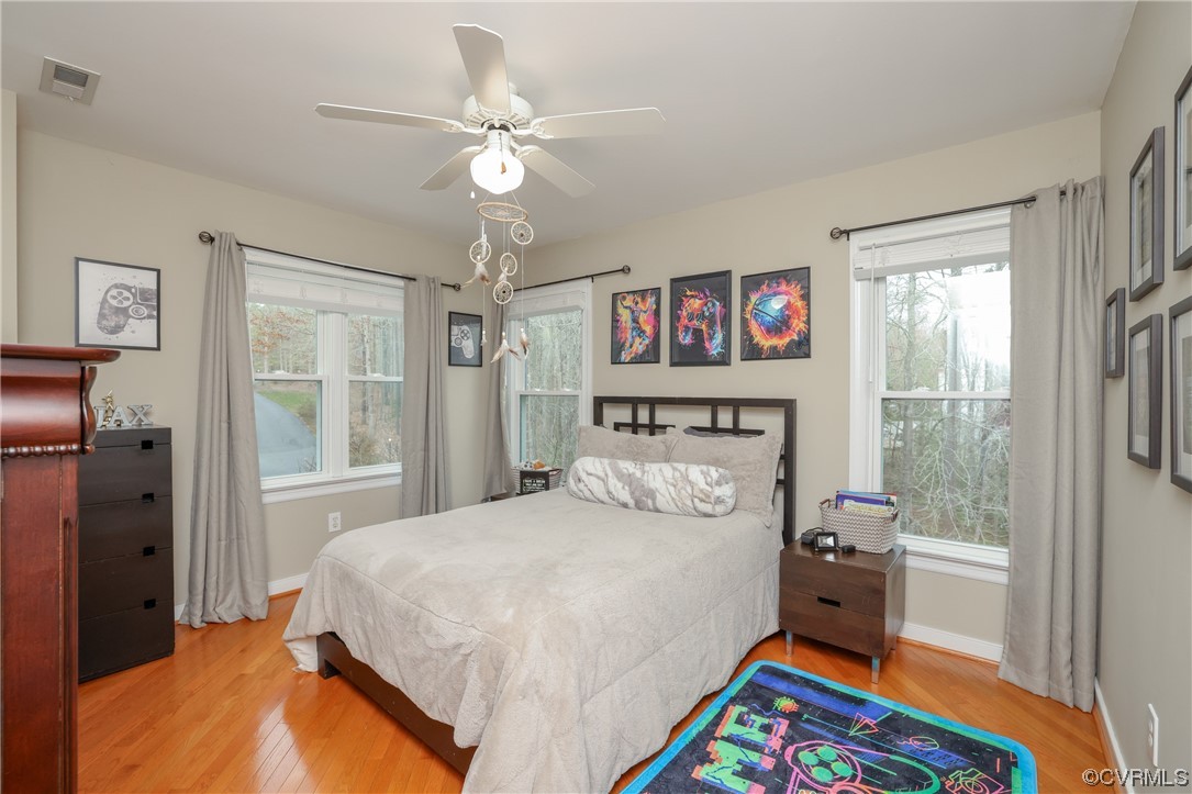 Spacious bedroom on second floor with hardwoods, walk in closet, and jack and jill bath