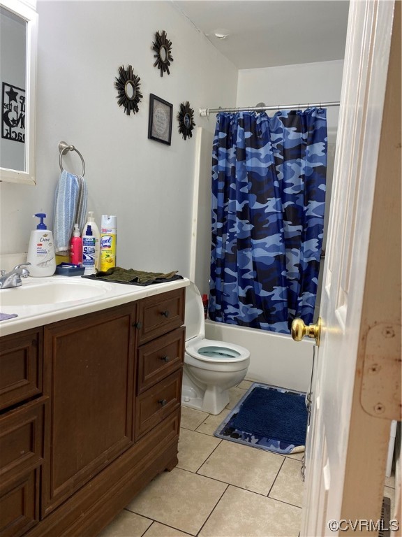Bathroom of 1309: Ceramic tile flooring, shower/tub combo, newer vanity/sink.