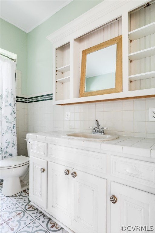 Second floor Bathroom with vanity, tile walls, tile floors, toilet, and tasteful backsplash