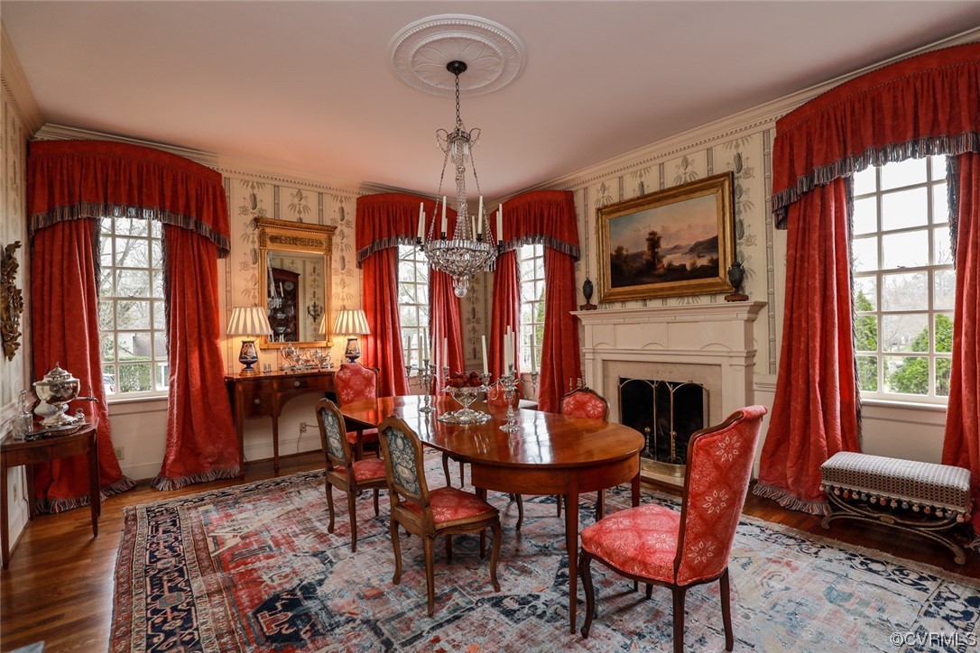 Formal rooms have oak floors. Living Room and Dining Room have symmetrically matched front and side windows.There is power to the ceiling medallion.