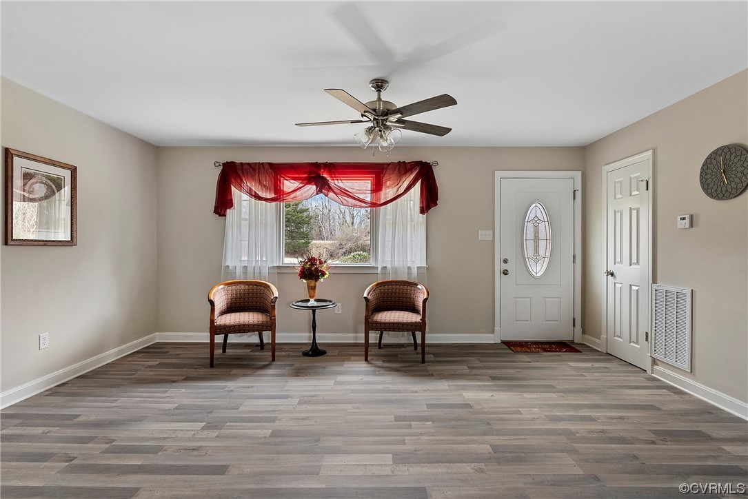 Family room with LPV Flooring and ceiling fan