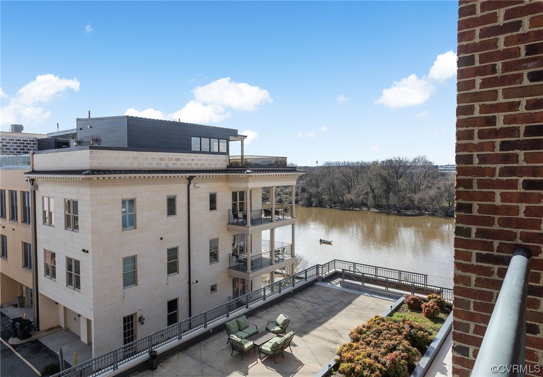 This is view from your balcony, overlooking one of the two large building terraces and the James River.