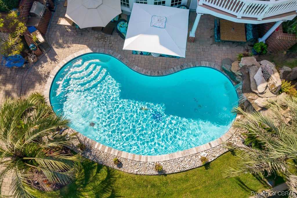 View of pool featuring a patio