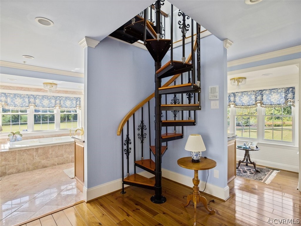 Spiral Staircase Located Within Primary Ensuite.  Owner Used The Room Above Staircase For An Exercise Room.  Would Make A Wonderful Library.