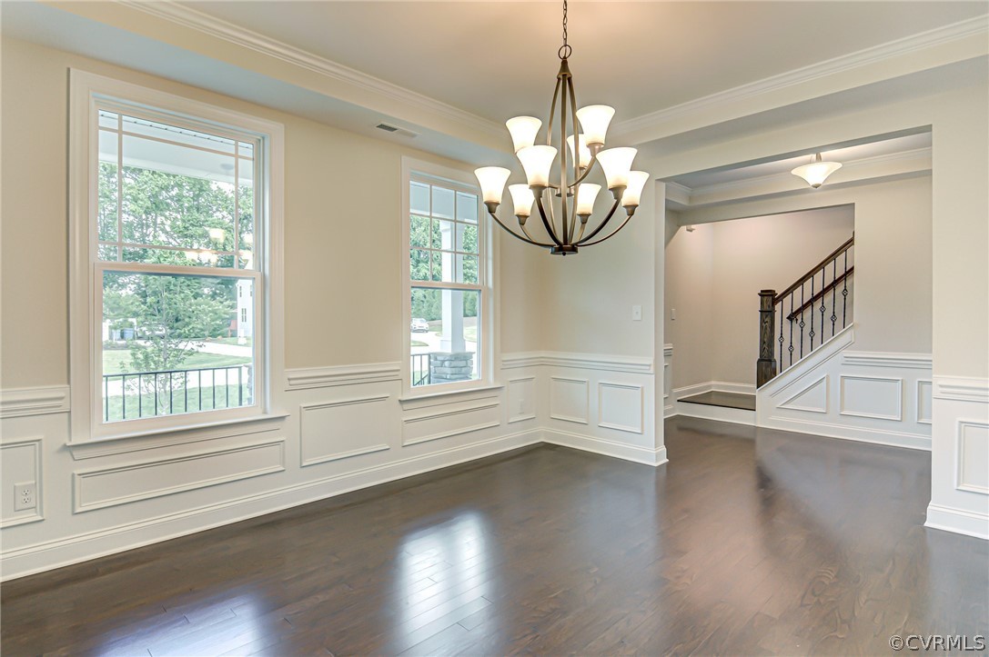 Photo represents the plan, not the actual home. Design selections may vary. As you step inside, you’ll find the formal dining room directly off of the foyer.