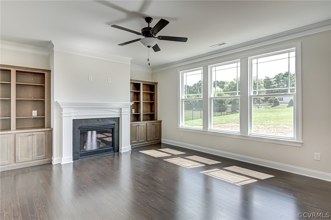 Photo represents the plan, not the actual home. Design selections may vary. Enjoy entertaining guests in the spacious family room w/ gas fireplace.