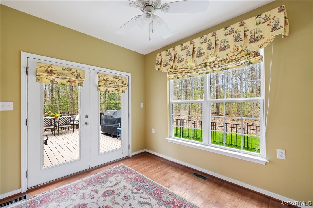 Sun Room/Morning Room/Sitting Room.... door to deck, views to wooded rear yard