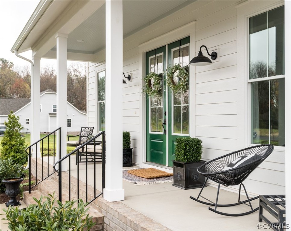 Enjoy coffee and peace on this front porch