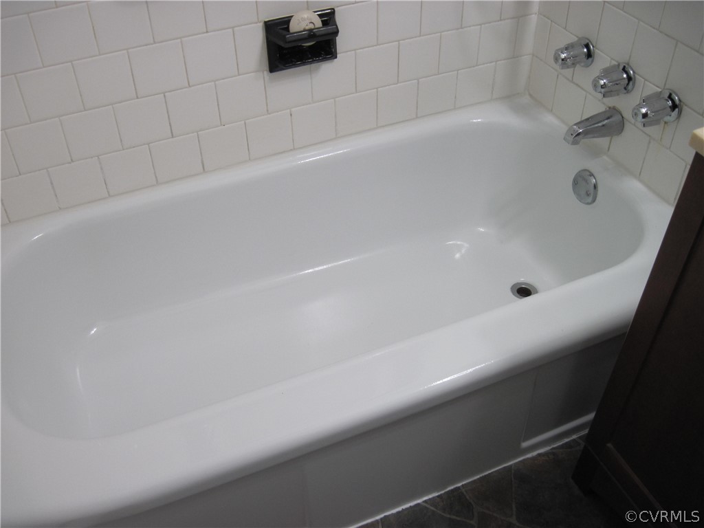 Reglazed bath tub.