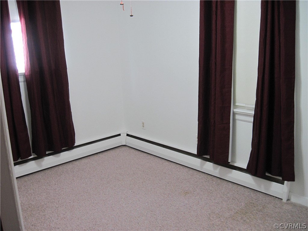 second bedroom with carpet.