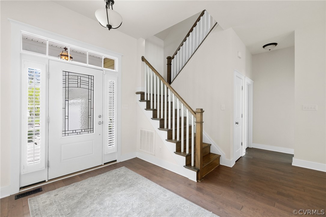 Open Foyer and 10' ceilings make this home light filled and airy