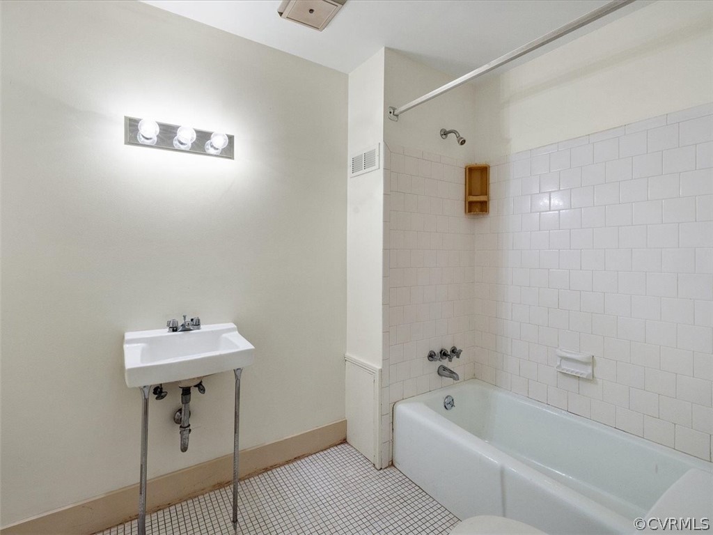 The English basement suite has a full bath off its one bedroom