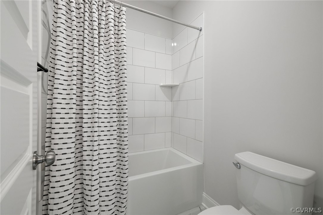 Jack & Jill Bathroom - shower & toilet room.