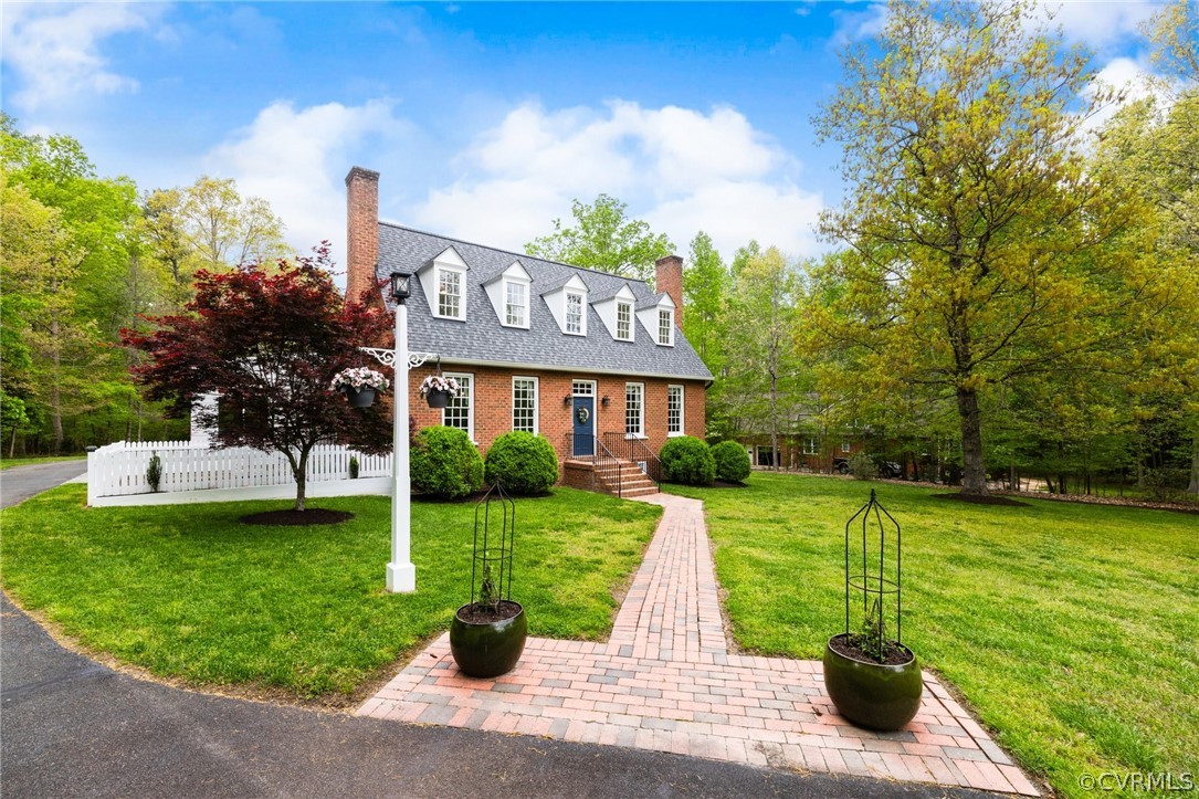 Handsome brick home with “Old-World” charm located on 2.4 acres!