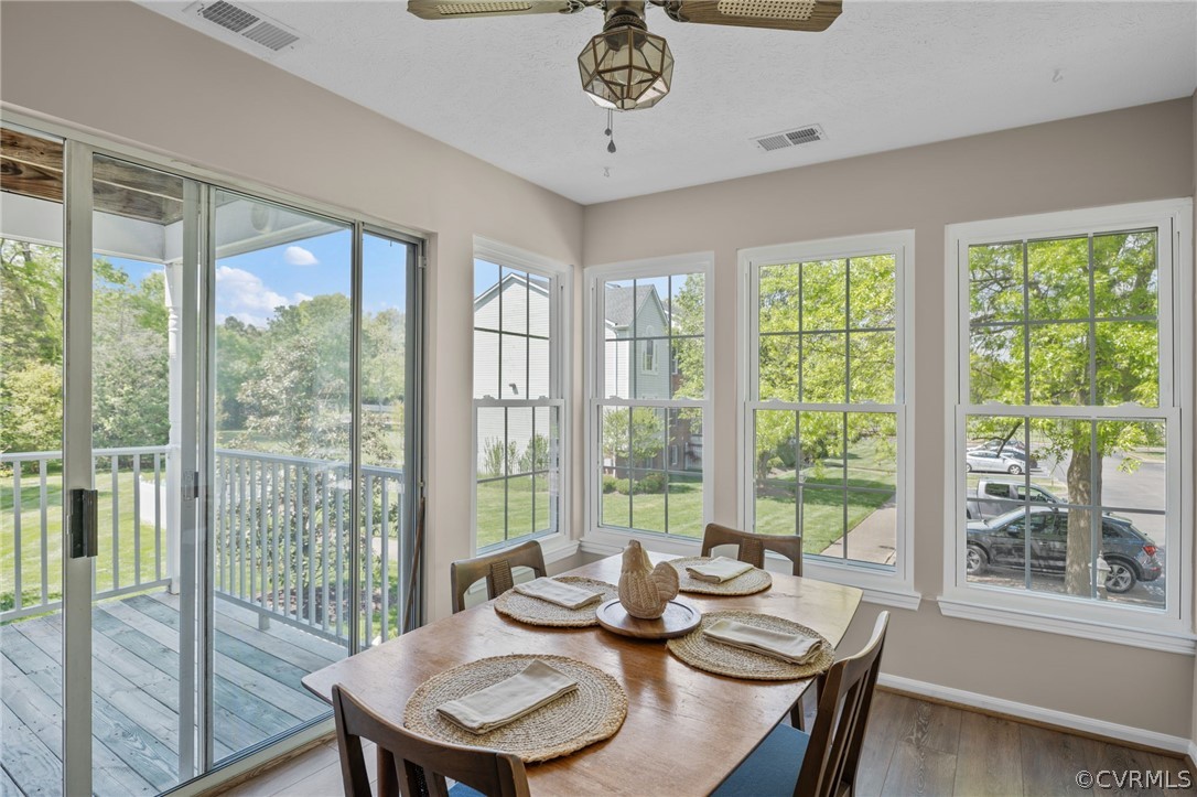 Sunroom or dining room-use this as you choose.  This opens to the deck and has new flooring and fresh paint.