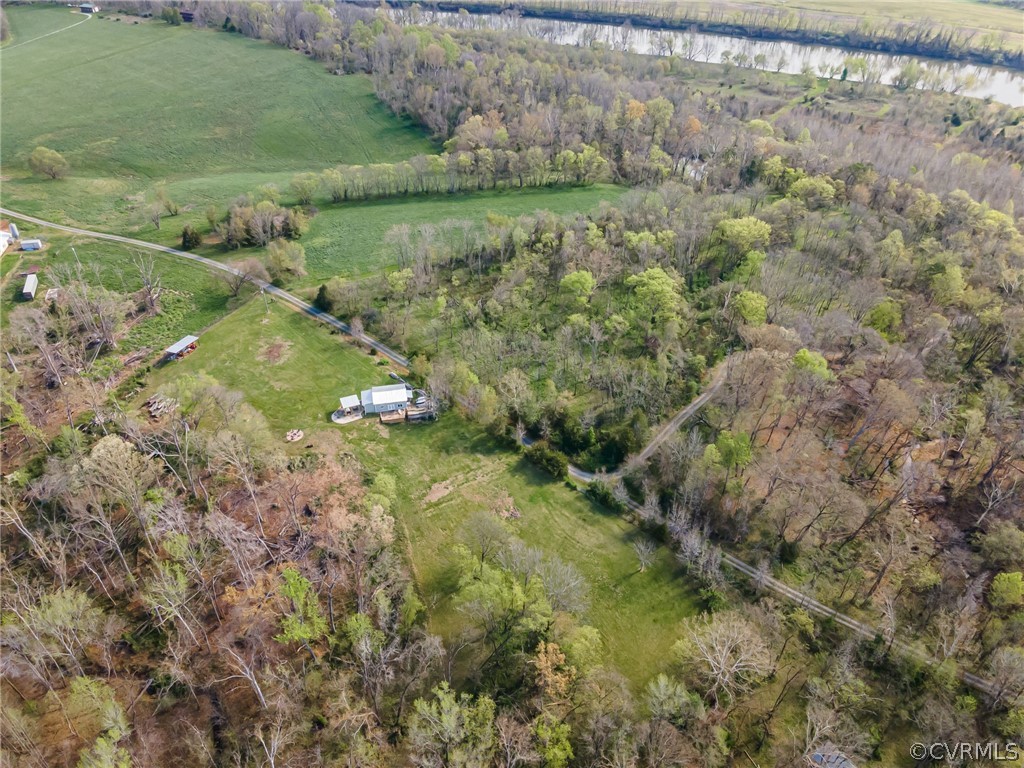 Birds eye view of property with a rural view
