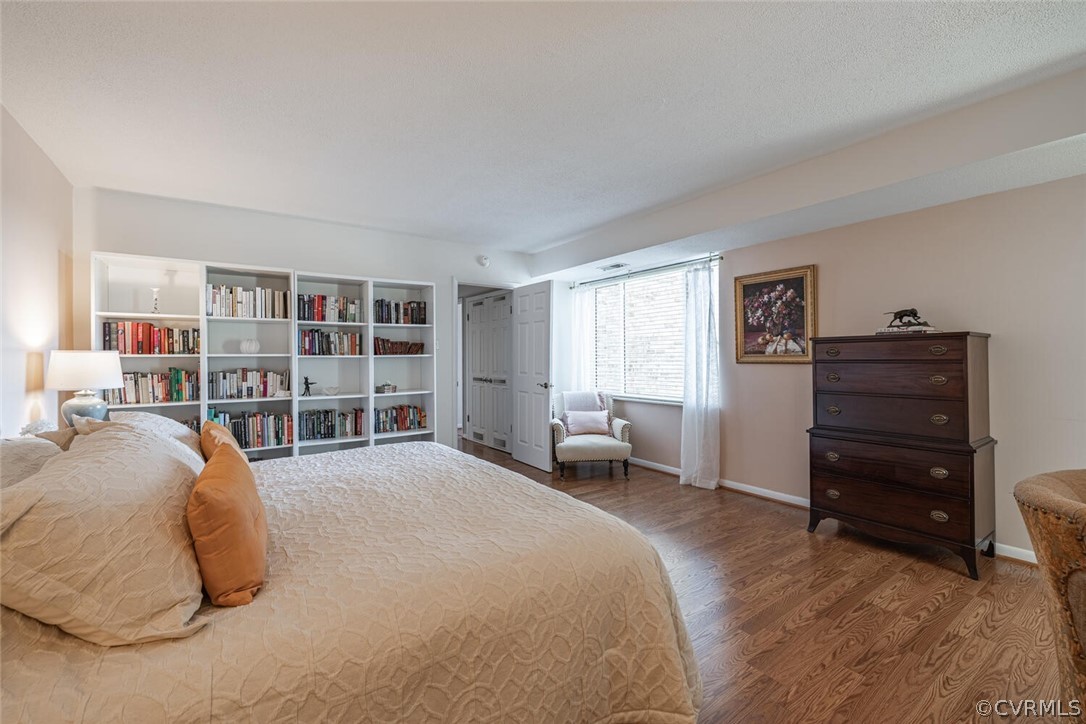 Spacious second bedroom doubles as an office here.  Large double closet with built-in organizers.