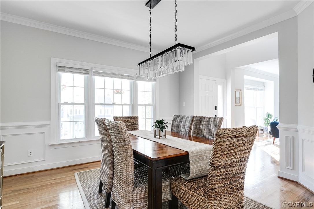 Dedicated dining space with stunning light fixture