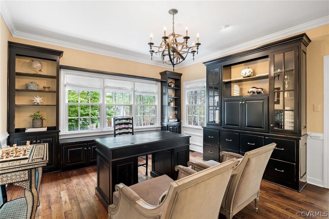 Home office with crown molding and dark hardwood / wood-style floors