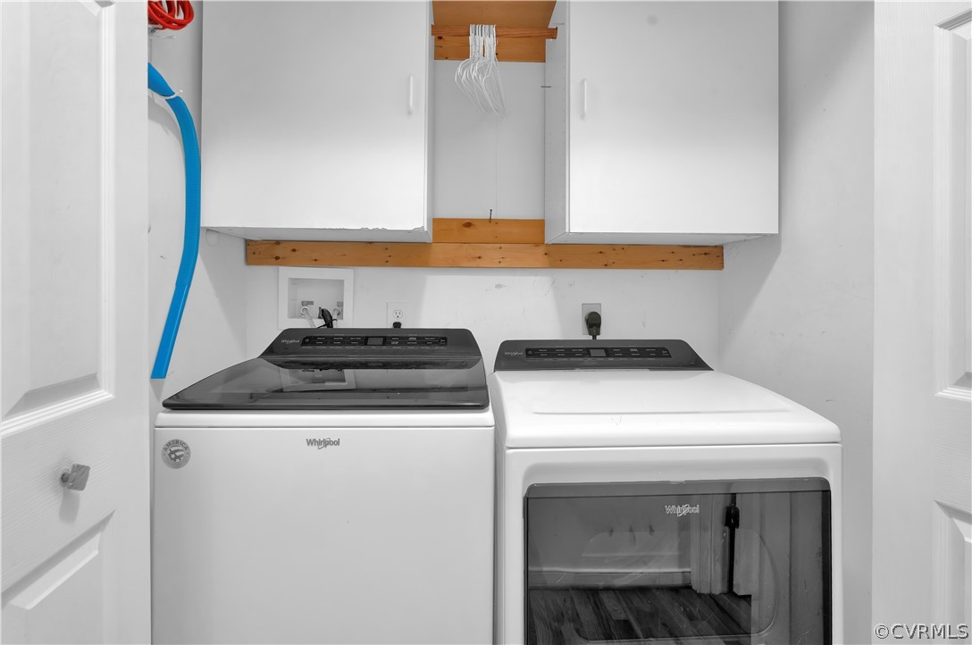 Laundry area with hookup for an electric dryer, hookup for a washing machine, and washer and dryer