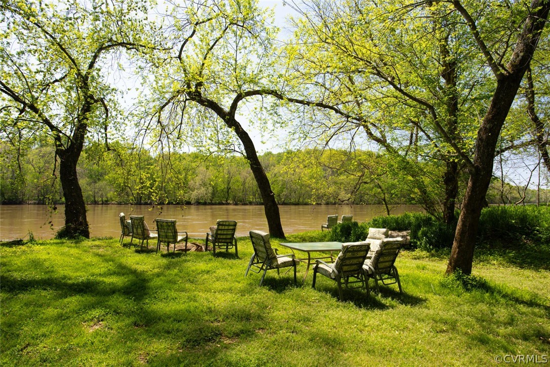 Private, shaded 131' of  river frontage with serene views and amazing sunsets.