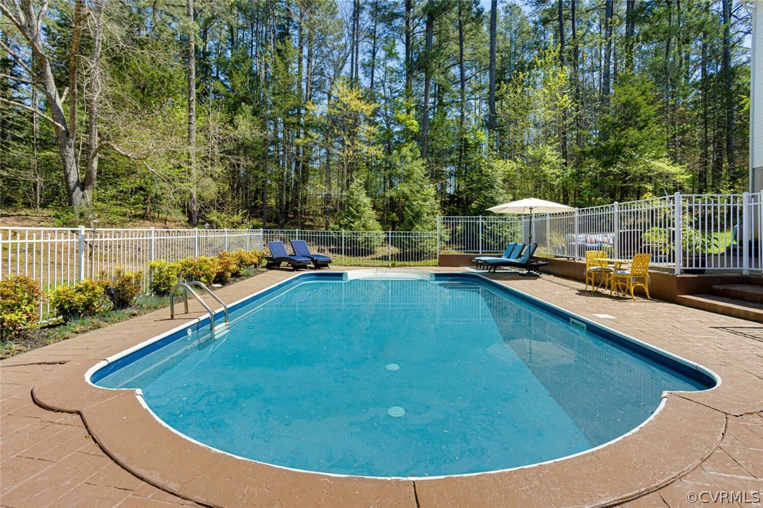 Enjoy the 38' x 18' salt water heated pool with stamped concrete surround. Roman steps to 3' depth at the shallow end and 6' at the deep end. Liner was replaced in 2021. Includes a winter cover and blanket cover. Aluminum safety fence.
