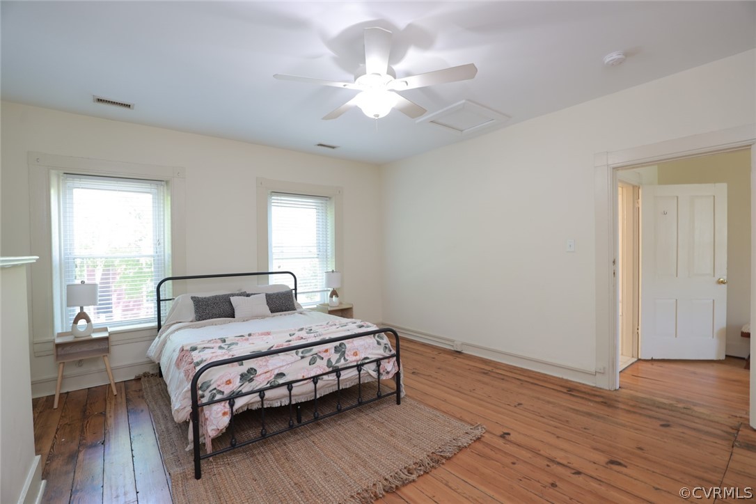 Bedroom featuring hardwood / wood-style flooring and ceiling​​‌​​​​‌​​‌‌​‌‌​​​‌‌​‌​‌​‌​​​‌​​ fan