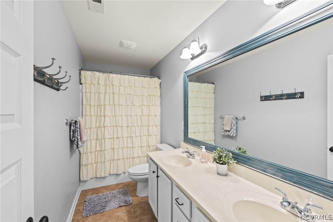 Hall Bathroom with tub/shower and double vanity