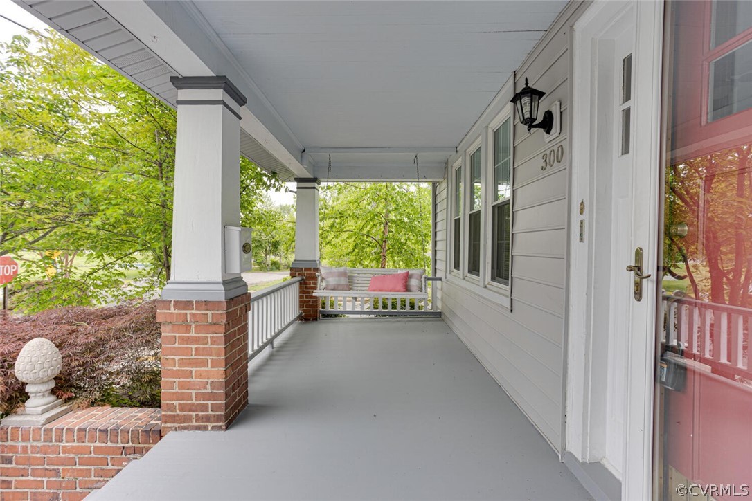 View of patio featuring covered porch