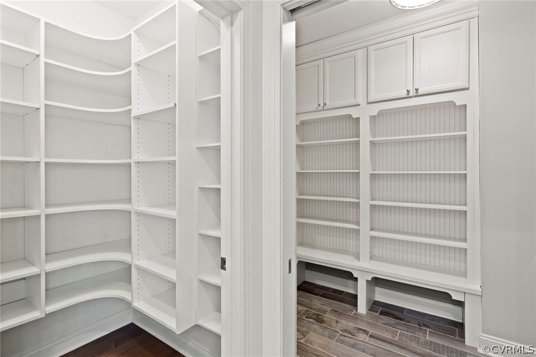 Custom shelving and drop zone in pantry and mud room/laundry.