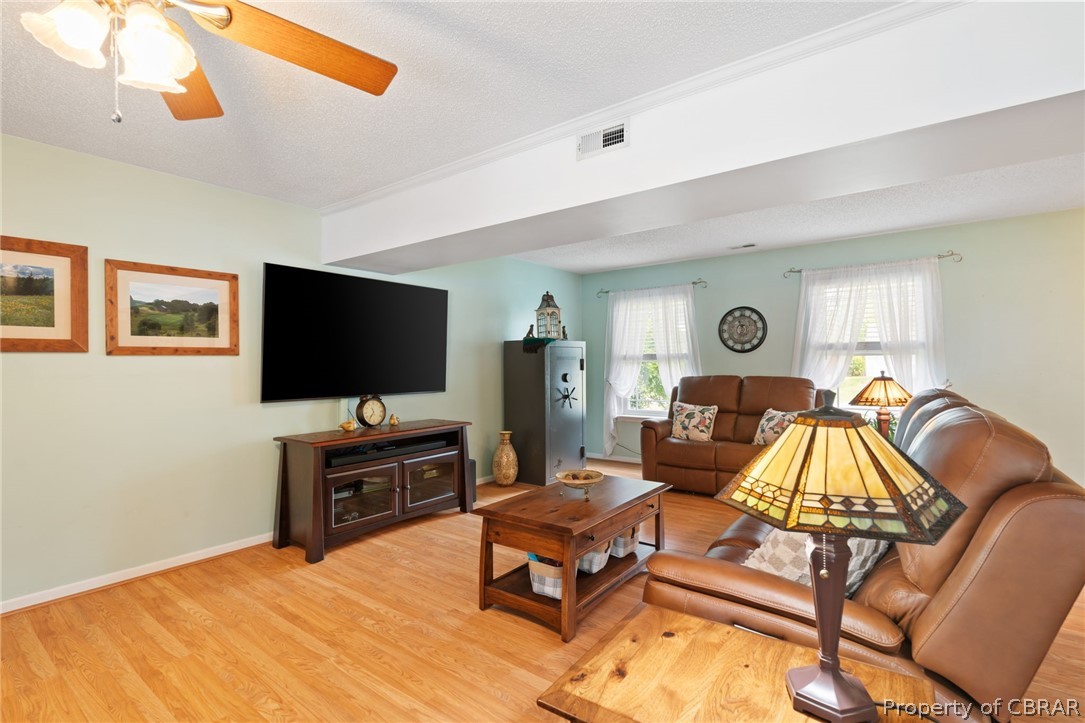 Family/Great Room ceiling fan in addition to wood stove.